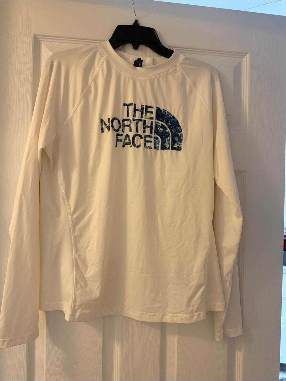 The North Face Cream Long Sleeve Logo Shirt with Blue Camo Logo